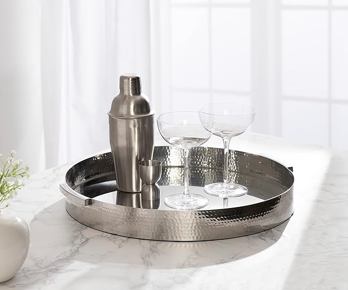 Kate and Laurel Samana Modern Glam Round Metal Tray; 16 Inch Diameter; Silver; Circular Polished Stainless Steel Decorative Tray with Hammered Surface and Minimalist Handles